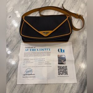 Yves Saint Laurent Black & Gold Textured Bag with Certification of Authenticity
